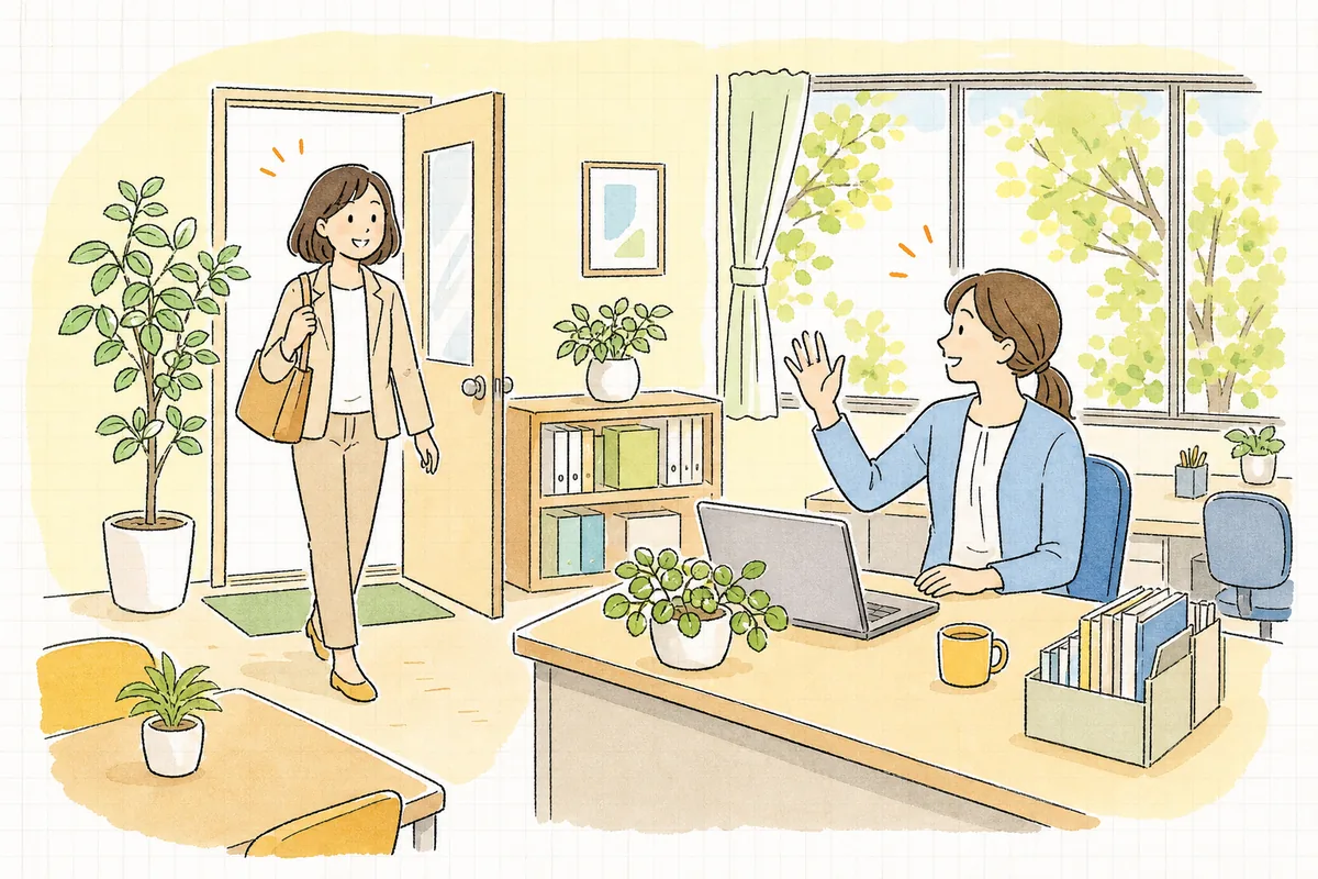 時間単位年休の導入準備を終え、席を外して戻ってきた社員を穏やかに迎えている労務担当者