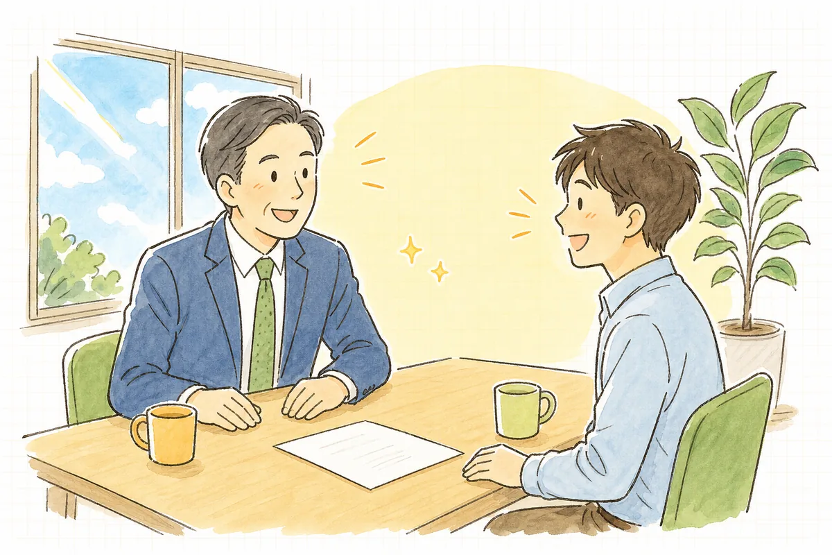 明るい会議スペースで、上司と部下が書類を前に穏やかに話し合い、部下が納得したように笑顔でうなずいている様子